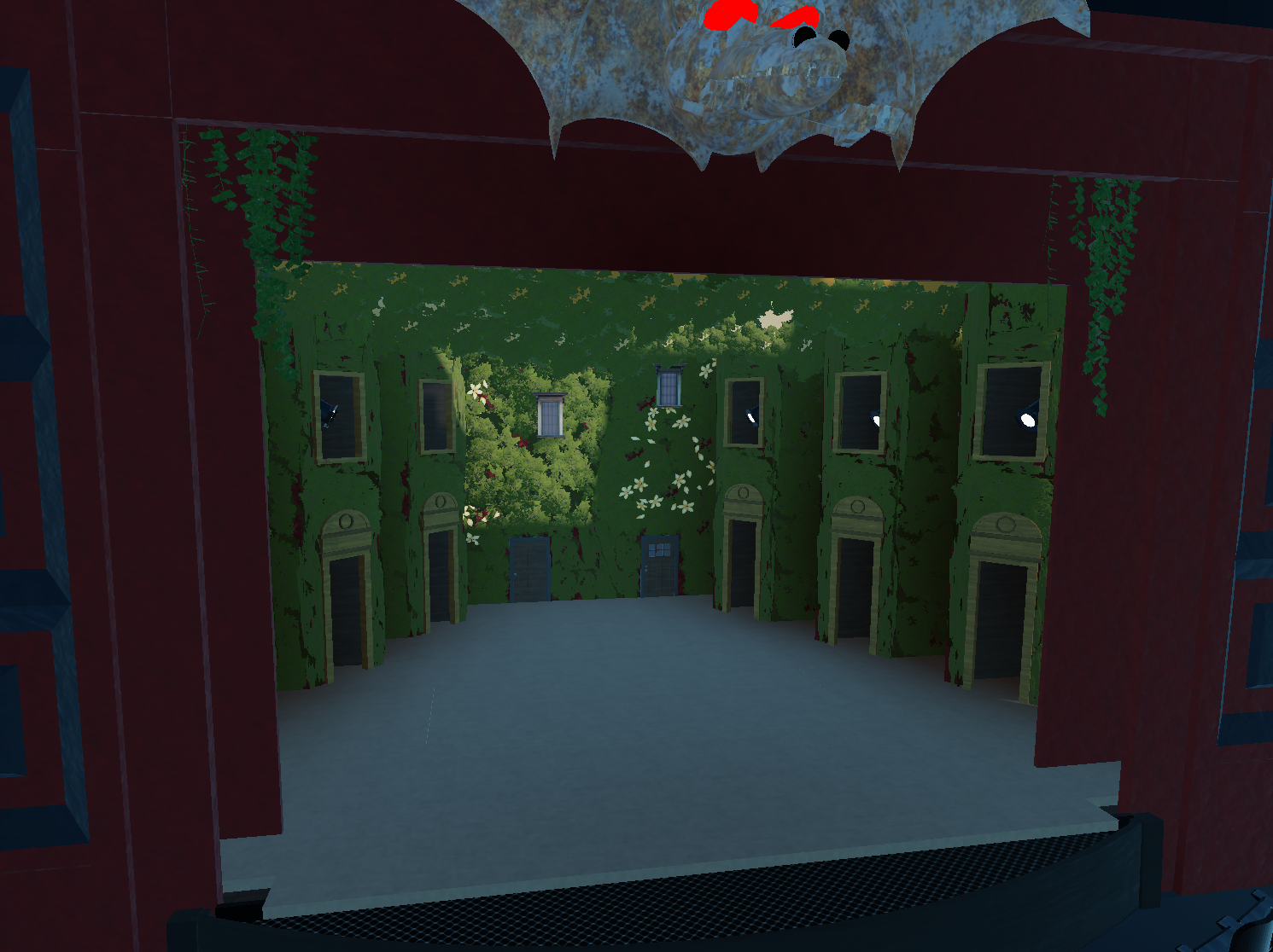 Escenografía de Wicked: arco del escenario y muros de hiedra